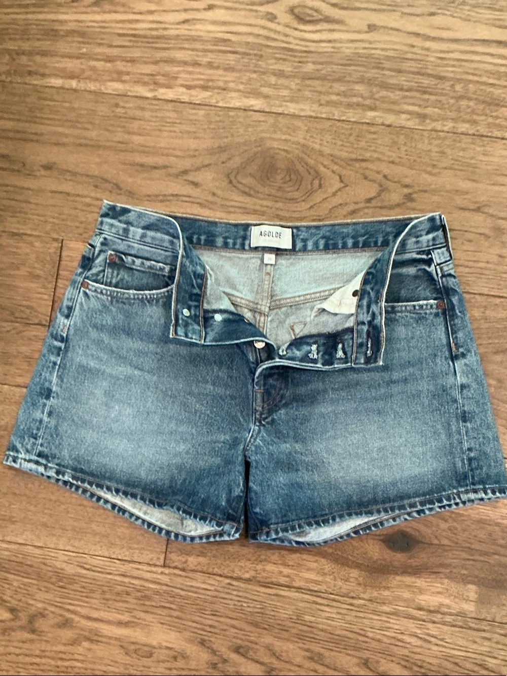 Agolde Faded Blue Denim Shortie Shorts